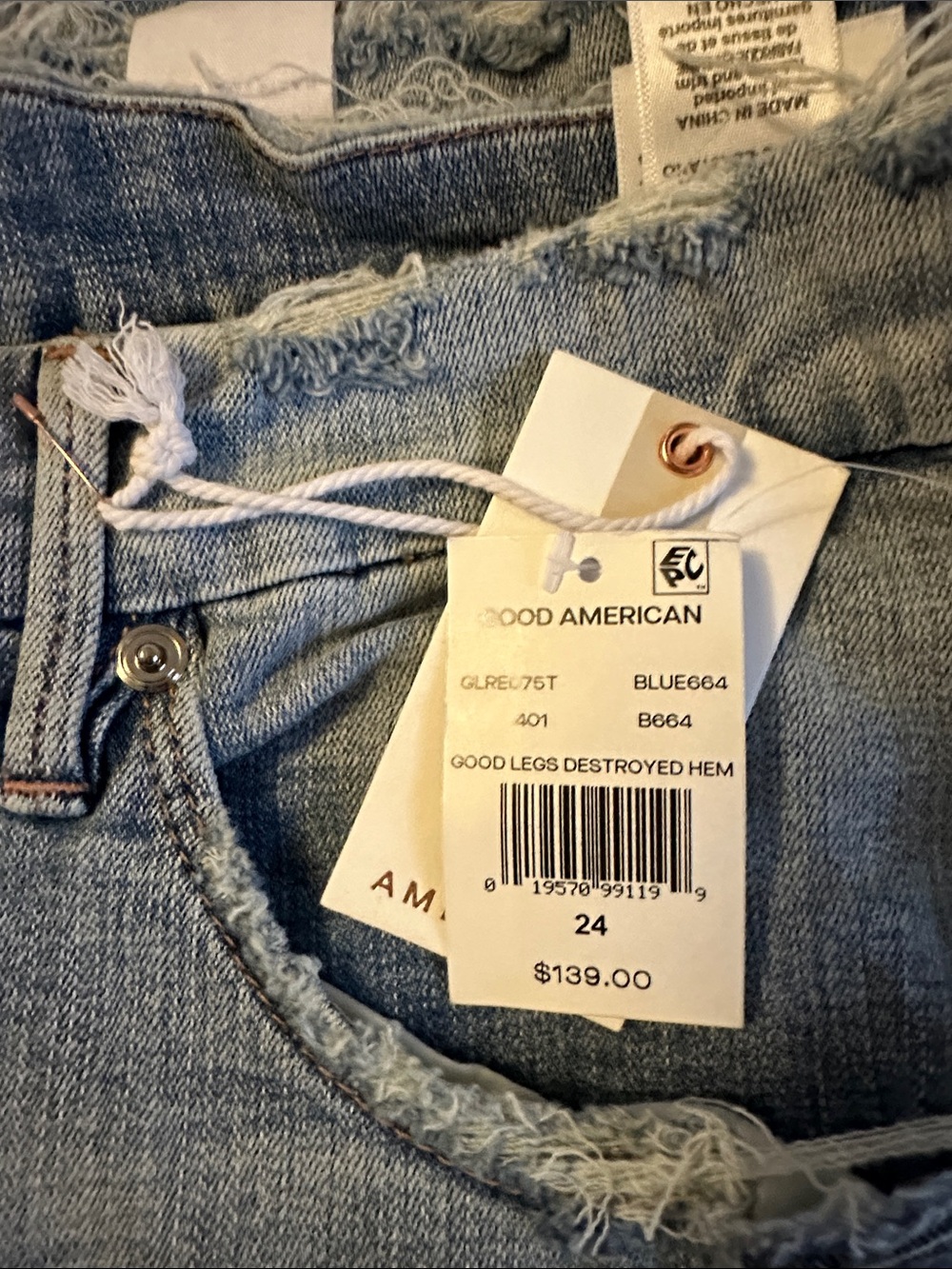 Good American Light Blue Distressed Hem High-Rise Jeans plus size